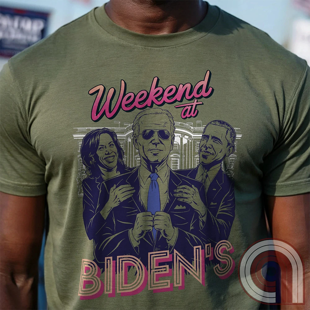 A hilarious political satire t-shirt featuring "Weekend at Biden’s," a parody of the classic comedy, reimagined with Joe Biden as the lifeless puppet propped up by Kamala Harris & Barack Obama. With a retro 80s aesthetic, this anti-establishment tee calls out the illusion of leadership & the deep-state handlers pulling the strings. A must-have for conservatives, libertarians, & free-thinkers who see through the charade. Perfect for rallies, protests, or just triggering clueless liberals! Color - Green1