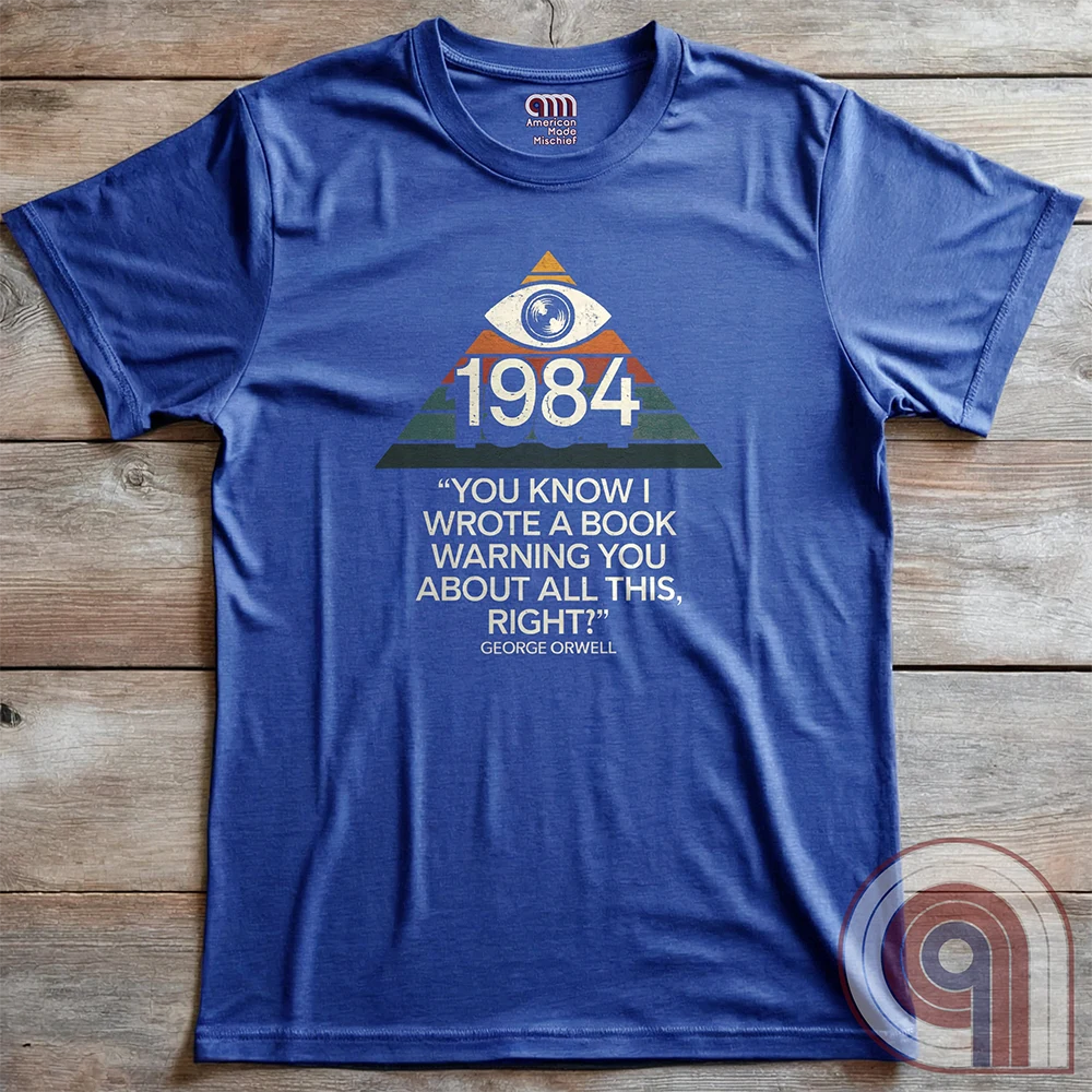 Big Brother Is All Seeing. This Orwellian dystopia shirt captures the chilling reality of mass surveillance, censorship, and authoritarian thought control. Designed for those who reject propaganda and resist digital tyranny, this bold graphic tee is a must-have for defenders of free speech. Every camera, every data log, every restriction—the system grows stronger. Stay vigilant, speak truth, and never submit to those who erase history to control the future. The fight for truth is far from over! Color: Blue