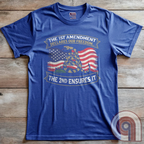 Stand for free speech and gun rights with this bold 1st & 2nd Amendment t-shirt. A distressed American flag with a coiled Gadsden snake, symbolizing freedom and resistance. ‘The 1st Amendment Declares Our Freedom… The 2nd Ensures It’ highlights the vital connection between free speech and the right to bear arms. A powerful design for gun rights advocates, patriots, and defenders of liberty who believe in self-defense, constitutional rights, and protecting American independence from tyranny. Color:  Blue