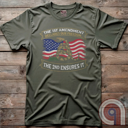 Stand for free speech and gun rights with this bold 1st & 2nd Amendment t-shirt. A distressed American flag with a coiled Gadsden snake, symbolizing freedom and resistance. ‘The 1st Amendment Declares Our Freedom… The 2nd Ensures It’ highlights the vital connection between free speech and the right to bear arms. A powerful design for gun rights advocates, patriots, and defenders of liberty who believe in self-defense, constitutional rights, and protecting American independence from tyranny. Color: Green