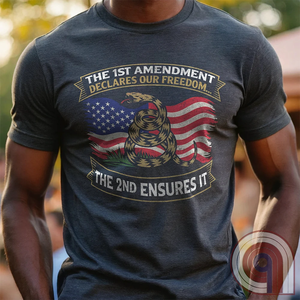 Stand for free speech and gun rights with this bold 1st & 2nd Amendment t-shirt. A distressed American flag with a coiled Gadsden snake, symbolizing freedom and resistance. ‘The 1st Amendment Declares Our Freedom… The 2nd Ensures It’ highlights the vital connection between free speech and the right to bear arms. A powerful design for gun rights advocates, patriots, and defenders of liberty who believe in self-defense, constitutional rights, and protecting American independence from tyranny. Color: Charc
