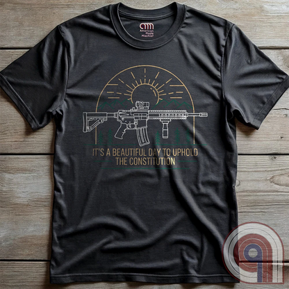 America was forged by the armed & unafraid. This ‘It’s a Beautiful Day to Uphold the Constitution’ t-shirt fuses the love of firearms with the untamed American spirit. Featuring an AR-15 set against rugged mountains and a blazing sunrise, this design screams independence, defiance, & unbreakable resolve. Whether you’re a hunter, soldier, or just a patriot who will not comply, this 2A shirt is a warning to tyrants: We don’t retreat. We reload. Wear it proudly and show that America will never bow; Color- Char