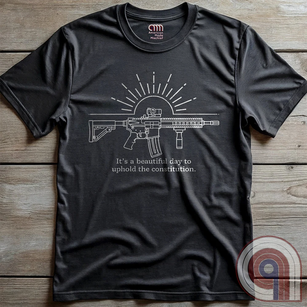 Freedom isn’t given, it’s defended. This ‘It’s a Beautiful Day to Uphold the Constitution’ t-shirt makes it clear—you’re armed, awake, & ready. Featuring an AR-15 against the rising sun, this pro-2A tee is for those who refuse to kneel to gun-grabbers, bureaucrats, or spineless politicians. Wear this bold firearm shirt as a warning: The 2nd Amendment isn’t up for debate. Patriots stand, cowards beg. Choose your side, make your statement, & remind the world why we will never surrender our rights;Color:Charc