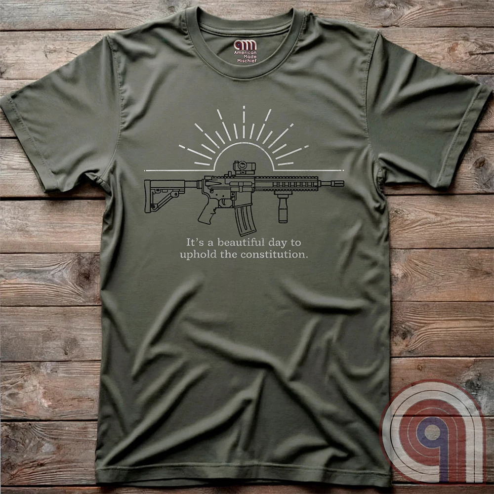Freedom isn’t given, it’s defended. This ‘It’s a Beautiful Day to Uphold the Constitution’ t-shirt makes it clear—you’re armed, awake, & ready. Featuring an AR-15 against the rising sun, this pro-2A tee is for those who refuse to kneel to gun-grabbers, bureaucrats, or spineless politicians. Wear this bold firearm shirt as a warning: The 2nd Amendment isn’t up for debate. Patriots stand, cowards beg. Choose your side, make your statement, & remind the world why we will never surrender our rights;Color:Green