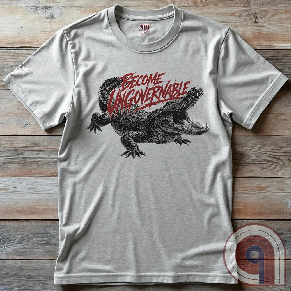 The modern world runs on control, structure, & compliance—but not everything is meant to be governed. This feral graphic tee channels raw instinct, reptilian awareness, &  refusal to be domesticated. Independence without permission, defiance without apology, & a mindset that doesn’t bend, break, or submit. For those who move differently, think independently, & operate outside imposed limits. Bold statement for fans of rebellion, freedom, primal instinct, & unapologetic self-governance. Ash on wooden panels