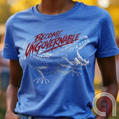 The modern world runs on control, structure, & compliance—but not everything is meant to be governed. This feral graphic tee channels raw instinct, reptilian awareness, &  refusal to be domesticated. Independence without permission, defiance without apology, & a mindset that doesn’t bend, break, or submit. For those who move differently, think independently, & operate outside imposed limits. Bold statement for fans of rebellion, freedom, primal instinct, & unapologetic self-governance. Blue on female model