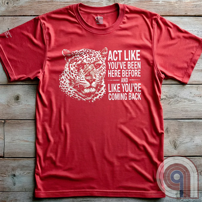 High contrast scarred leopard face predator t-shirt with a battle-worn expression and commanding presence - "act like you've been here before and like you're coming back". Dominance, confidence, courage, and relentless grit, emphasizing an alpha mindset, resilience, discipline, strength, leadership, mental toughness, independence, authority, focus, warrior spirit, primal instinct, perseverance, and fearless attitude tee for those who lead, embrace challenge, endure pressure, and refuse weakness. Red