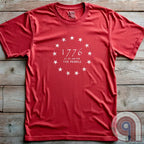 Embrace the revolutionary spirit with this 1776 patriotic t-shirt featuring the 13 stars of the Grand Union Flag, symbolizing the original American colonies & the fight for liberty. This Tee is a tribute to the Founding Fathers & their bold declaration of independence, standing against tyranny & forging a nation built on freedom. Perfect for patriots, history lovers, & defenders of American values, this shirt is a statement of unwavering commitment to liberty, self-rule, & constitutional rights. Color - Red