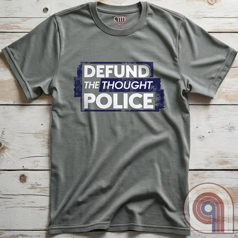 Reject censorship and stand up for free speech with this Defund the Thought Police tee inspired by Orwell’s 1984. A bold statement against authoritarian control, cancel culture, & media manipulation, this freedom of speech apparel is perfect for patriots, independent thinkers, & 1A advocates. Whether you oppose Big Brother, thought crimes, or government overreach, this anti-authoritarian apparel lets you wear your defiance proudly. A conservative shirt that defends liberty and free expression. Color: Grey