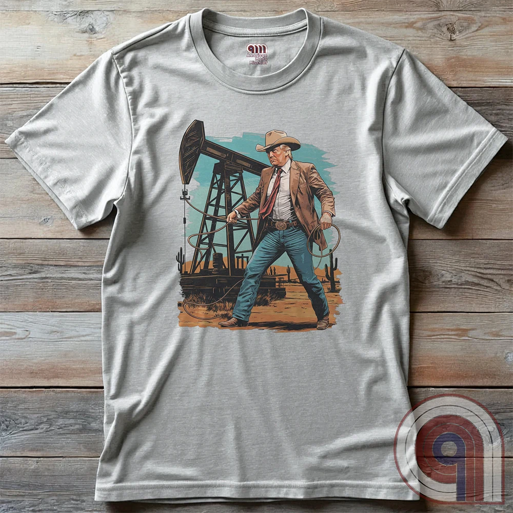 Drill baby drill! This bold Trump cowboy t-shirt captures the spirit of American energy independence with a rugged, Western-style design featuring Donald Trump as a Texas oilman in cowboy boots and hat, he stands tall in front of an oil rig, ready to unleash America’s untapped potential. A nod to capitalism, prosperity, & breaking free from foreign energy dependence, this fun patriotic tee is perfect for oil workers, entrepreneurs, & anyone who believes in unleashing the USA’s natural resources. Color-Ash2