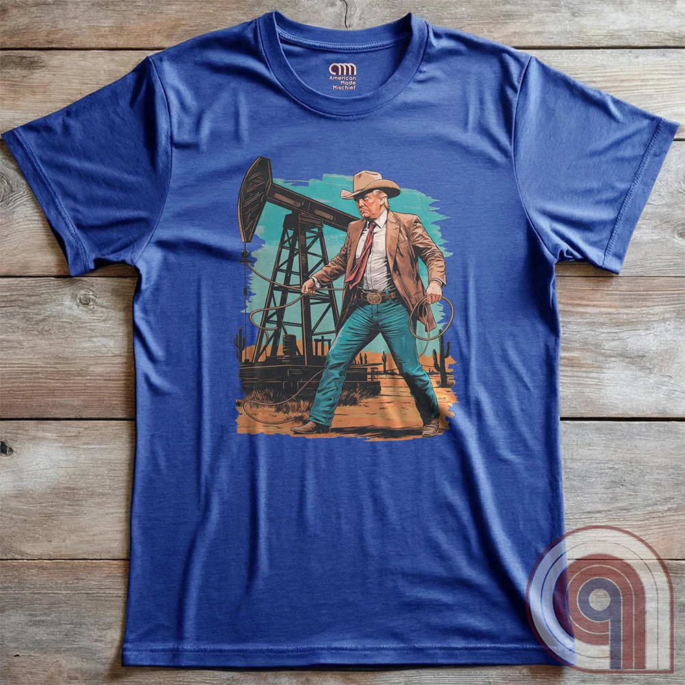Drill baby drill! This bold Trump cowboy t-shirt captures the spirit of American energy independence with a rugged, Western-style design featuring Donald Trump as a Texas oilman in cowboy boots and hat, he stands tall in front of an oil rig, ready to unleash America’s untapped potential. A nod to capitalism, prosperity, & breaking free from foreign energy dependence, this fun patriotic tee is perfect for oil workers, entrepreneurs, & anyone who believes in unleashing the USA’s natural resources. Color-Blue2