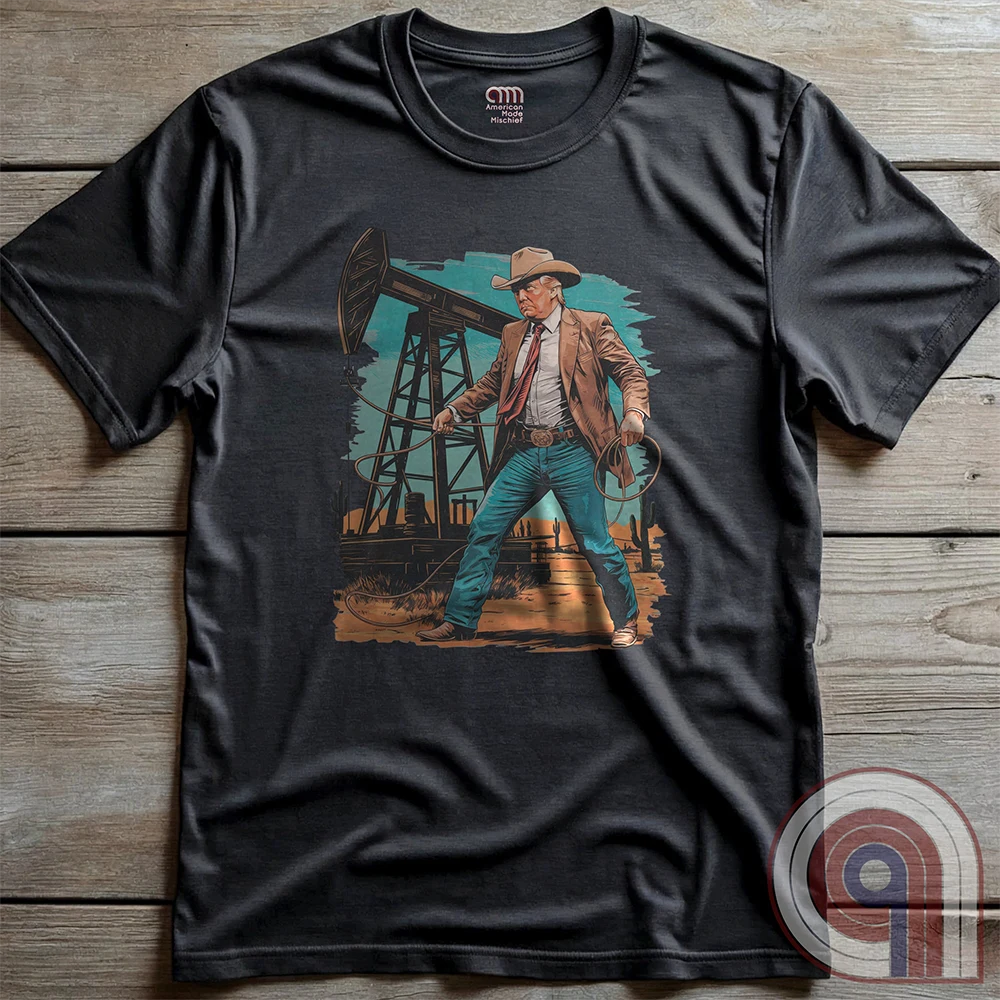 Drill baby drill! This bold Trump cowboy t-shirt captures the spirit of American energy independence with a rugged, Western-style design featuring Donald Trump as a Texas oilman in cowboy boots and hat, he stands tall in front of an oil rig, ready to unleash America’s untapped potential. A nod to capitalism, prosperity, & breaking free from foreign energy dependence, this fun patriotic tee is perfect for oil workers, entrepreneurs, & anyone who believes in unleashing the USA’s natural resources. Color-Chrc2