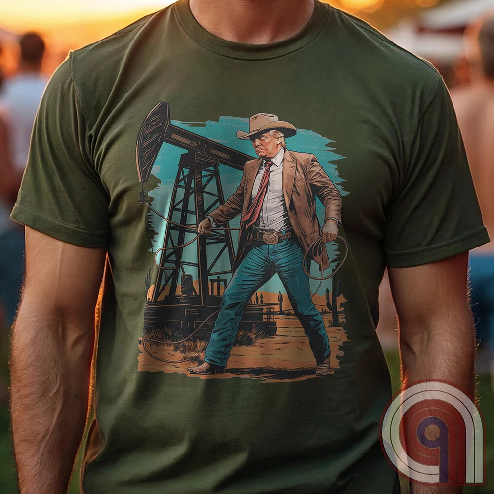 Drill baby drill! This bold Trump cowboy t-shirt captures the spirit of American energy independence with a rugged, Western-style design featuring Donald Trump as a Texas oilman in cowboy boots and hat, he stands tall in front of an oil rig, ready to unleash America’s untapped potential. A nod to capitalism, prosperity, & breaking free from foreign energy dependence, this fun patriotic tee is perfect for oil workers, entrepreneurs, & anyone who believes in unleashing the USA’s natural resources. Color-Green