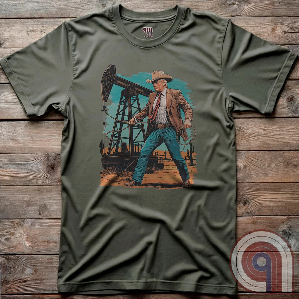 Drill baby drill! This bold Trump cowboy t-shirt captures the spirit of American energy independence with a rugged, Western-style design featuring Donald Trump as a Texas oilman in cowboy boots and hat, he stands tall in front of an oil rig, ready to unleash America’s untapped potential. A nod to capitalism, prosperity, & breaking free from foreign energy dependence, this fun patriotic tee is perfect for oil workers, entrepreneurs, & anyone who believes in unleashing the USA’s natural resources. Color-Green