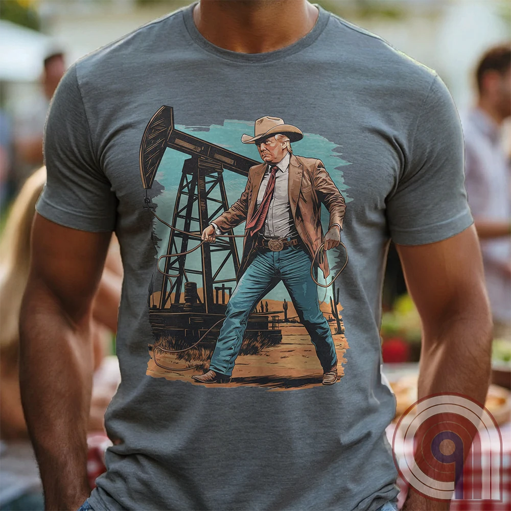 Drill baby drill! This bold Trump cowboy t-shirt captures the spirit of American energy independence with a rugged, Western-style design featuring Donald Trump as a Texas oilman in cowboy boots and hat, he stands tall in front of an oil rig, ready to unleash America’s untapped potential. A nod to capitalism, prosperity, & breaking free from foreign energy dependence, this fun patriotic tee is perfect for oil workers, entrepreneurs, & anyone who believes in unleashing the USA’s natural resources. Color-Grey1