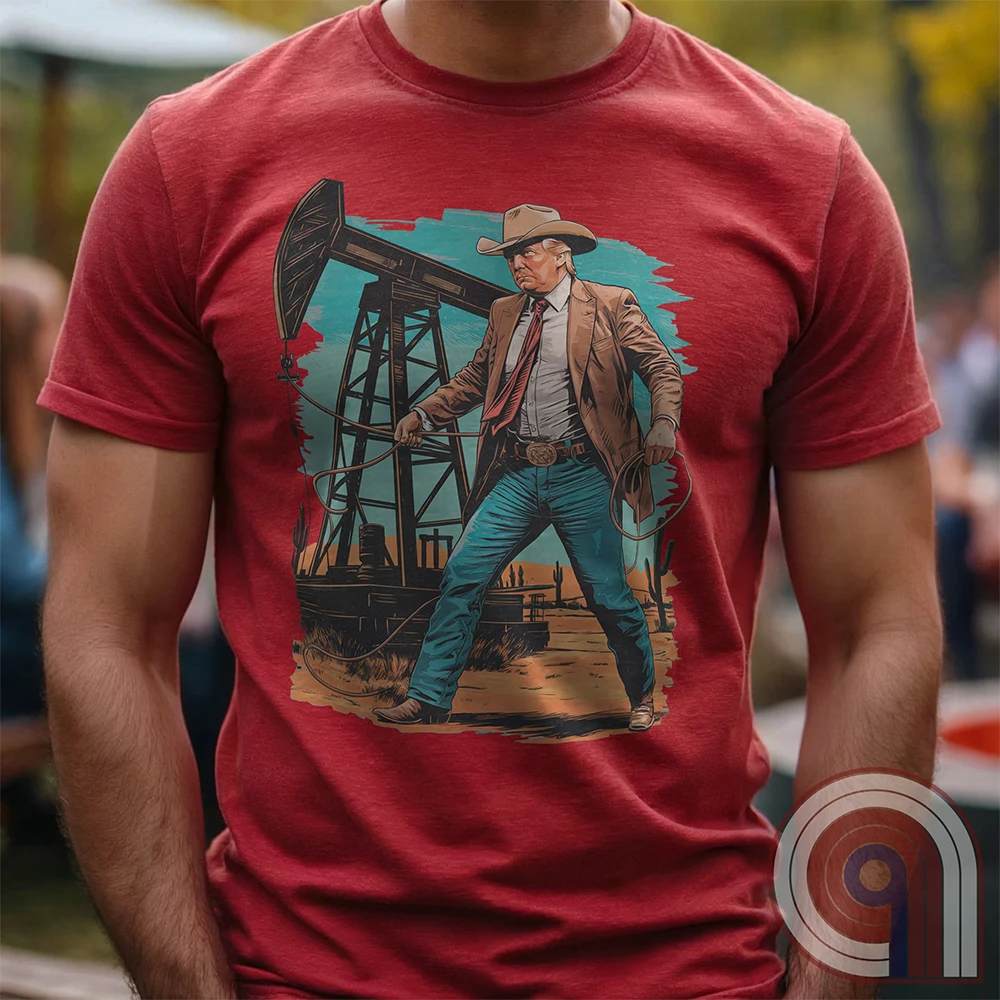 Drill baby drill! This bold Trump cowboy t-shirt captures the spirit of American energy independence with a rugged, Western-style design featuring Donald Trump as a Texas oilman in cowboy boots and hat, he stands tall in front of an oil rig, ready to unleash America’s untapped potential. A nod to capitalism, prosperity, & breaking free from foreign energy dependence, this fun patriotic tee is perfect for oil workers, entrepreneurs, & anyone who believes in unleashing the USA’s natural resources. Color-Red1