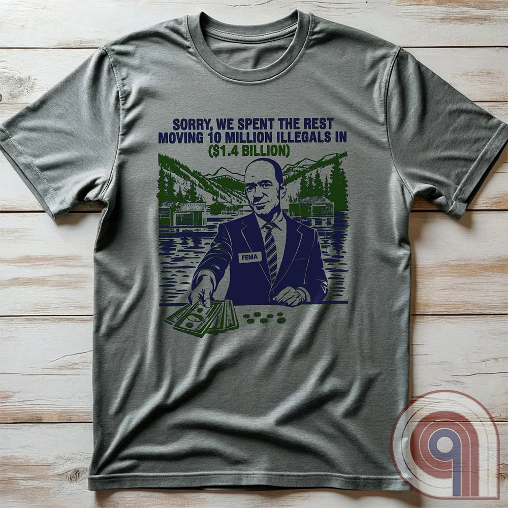 Humorous American conservative t shirt highlighting corruption and the failure of FEMA and the spending of all its resources moving illegal migrants into swing states - FJB shirt; migrant crisis; illegal immigration shirt; hurricane Helene; Asheville; Western North Carolina; North Carolina Flood; Helene Flood; FEMA T shirt; FEMA tee; funny political tee; humorous tee; funny t shirt - Grey