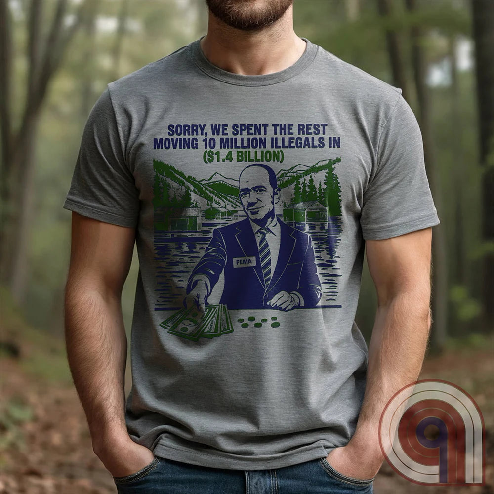 Humorous American conservative t shirt highlighting corruption and the failure of FEMA and the spending of all its resources moving illegal migrants into swing states - FJB shirt; migrant crisis; illegal immigration shirt; hurricane Helene; Asheville; Western North Carolina; North Carolina Flood; Helene Flood; FEMA T shirt; FEMA tee; funny political tee; humorous tee; funny t shirt - Grey