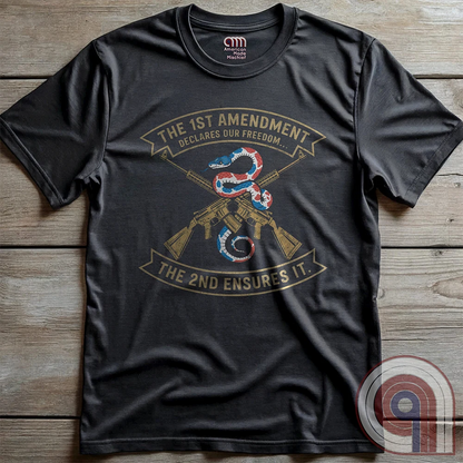 Show your commitment to the 1st & 2nd Amendments with this bold patriotic t-shirt. A fun 1A & 2A Tee featuring a red, white, & blue rattlesnake coiled around crossed rifles, this design represents free speech, gun rights, & resistance to tyranny. Perfect for Second Amendment supporters, constitutional patriots, & defenders of liberty. Whether you're standing against censorship or advocating for self-defense, this statement honors America’s founding principles and those who fight to protect them. Color:Charc
