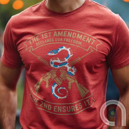 Show your commitment to the 1st & 2nd Amendments with this bold patriotic t-shirt. A fun 1A & 2A Tee featuring a red, white, & blue rattlesnake coiled around crossed rifles, this design represents free speech, gun rights, & resistance to tyranny. Perfect for Second Amendment supporters, constitutional patriots, & defenders of liberty. Whether you're standing against censorship or advocating for self-defense, this statement honors America’s founding principles and those who fight to protect them. Color: Red