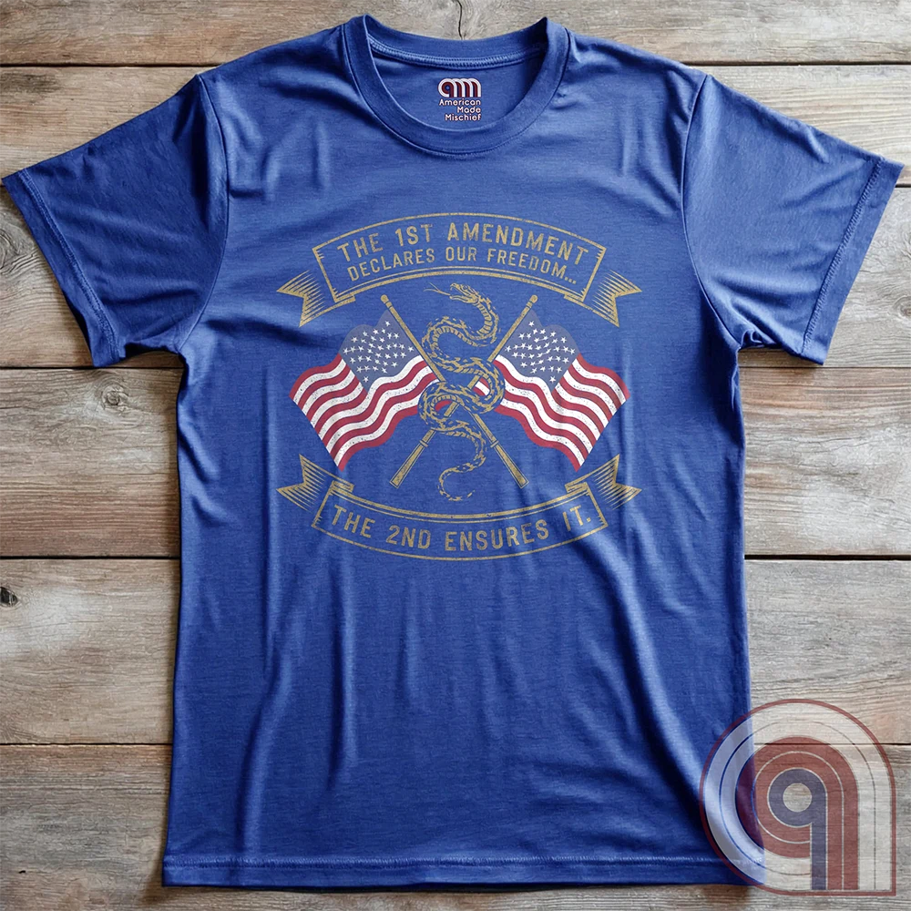 Declare your commitment to freedom & constitutional rights with this bold 1st & 2nd Amendment t-shirt. Featuring a Gadsden snake wrapped around crossed rifles with American flags symbolizing the fight for free speech & the right to bear arms. For Second Amendment supporters, liberty lovers, & patriots who stand against tyranny, censorship, & government overreach. Show your support for self-defense, independence, & American values with this powerful statement of resistance & American pride. Color: Blue