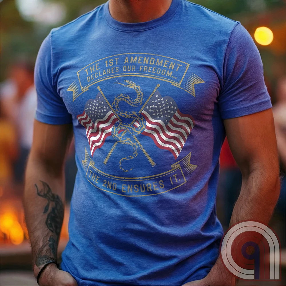 Declare your commitment to freedom & constitutional rights with this bold 1st & 2nd Amendment t-shirt. Featuring a Gadsden snake wrapped around crossed rifles with American flags symbolizing the fight for free speech & the right to bear arms. For Second Amendment supporters, liberty lovers, & patriots who stand against tyranny, censorship, & government overreach. Show your support for self-defense, independence, & American values with this powerful statement of resistance & American pride. Color: Blue