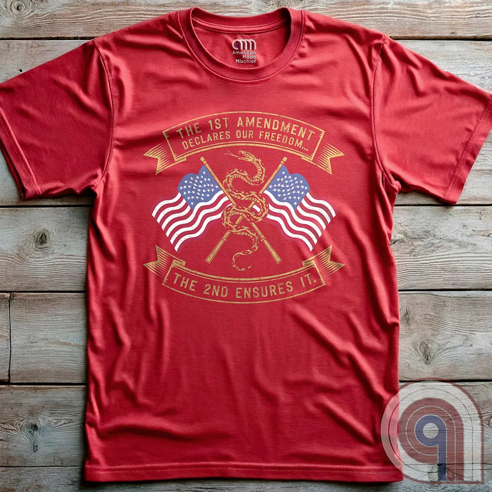 Declare your commitment to freedom & constitutional rights with this bold 1st & 2nd Amendment t-shirt. Featuring a Gadsden snake wrapped around crossed rifles with American flags symbolizing the fight for free speech & the right to bear arms. For Second Amendment supporters, liberty lovers, & patriots who stand against tyranny, censorship, & government overreach. Show your support for self-defense, independence, & American values with this powerful statement of resistance & American pride. Color: Red