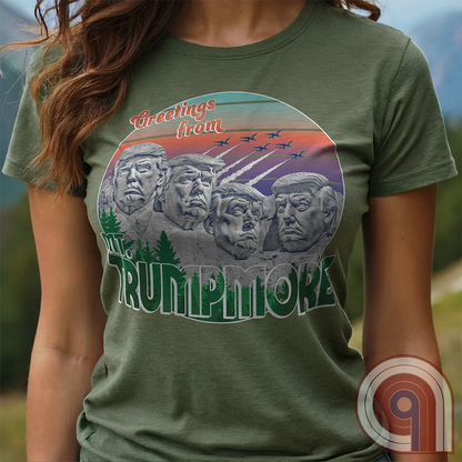 Celebrate American greatness with the "Greetings from Mt. Trumpmore" T-shirt, a bold patriotic parody of Mount Rushmore featuring Donald Trump’s face carved in stone. A retro-style souvenir tee perfect for MAGA supporters, conservatives, & those who see Trump as one of America’s greatest presidents. With vintage postcard aesthetics, fighter jets soaring in the sunset, & a nod to national pride, this Trump tribute shirt is a must-have for patriots who refuse to apologize for loving the USA. Color - Green