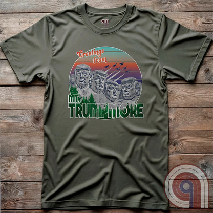 Celebrate American greatness with the "Greetings from Mt. Trumpmore" T-shirt, a bold patriotic parody of Mount Rushmore featuring Donald Trump’s face carved in stone. A retro-style souvenir tee perfect for MAGA supporters, conservatives, & those who see Trump as one of America’s greatest presidents. With vintage postcard aesthetics, fighter jets soaring in the sunset, & a nod to national pride, this Trump tribute shirt is a must-have for patriots who refuse to apologize for loving the USA. Color - Green2