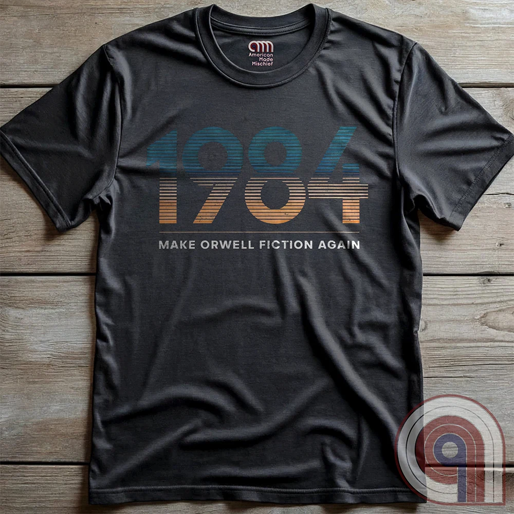 Censorship spreads like wildfire. This ‘Make Orwell Fiction Again’ t-shirt is for those who see past the lies and refuse to bow to the thought police. Featuring a powerful retro design, this shirt is a battle cry for free thinkers and speech warriors who defy controlled narratives. Because words are weapons and history is rewritten daily, this tee is the uniform of the resistance. Wear it and remind them that silence is complicity. The war on reality is waged in every headline and algorithm. Color: Charc