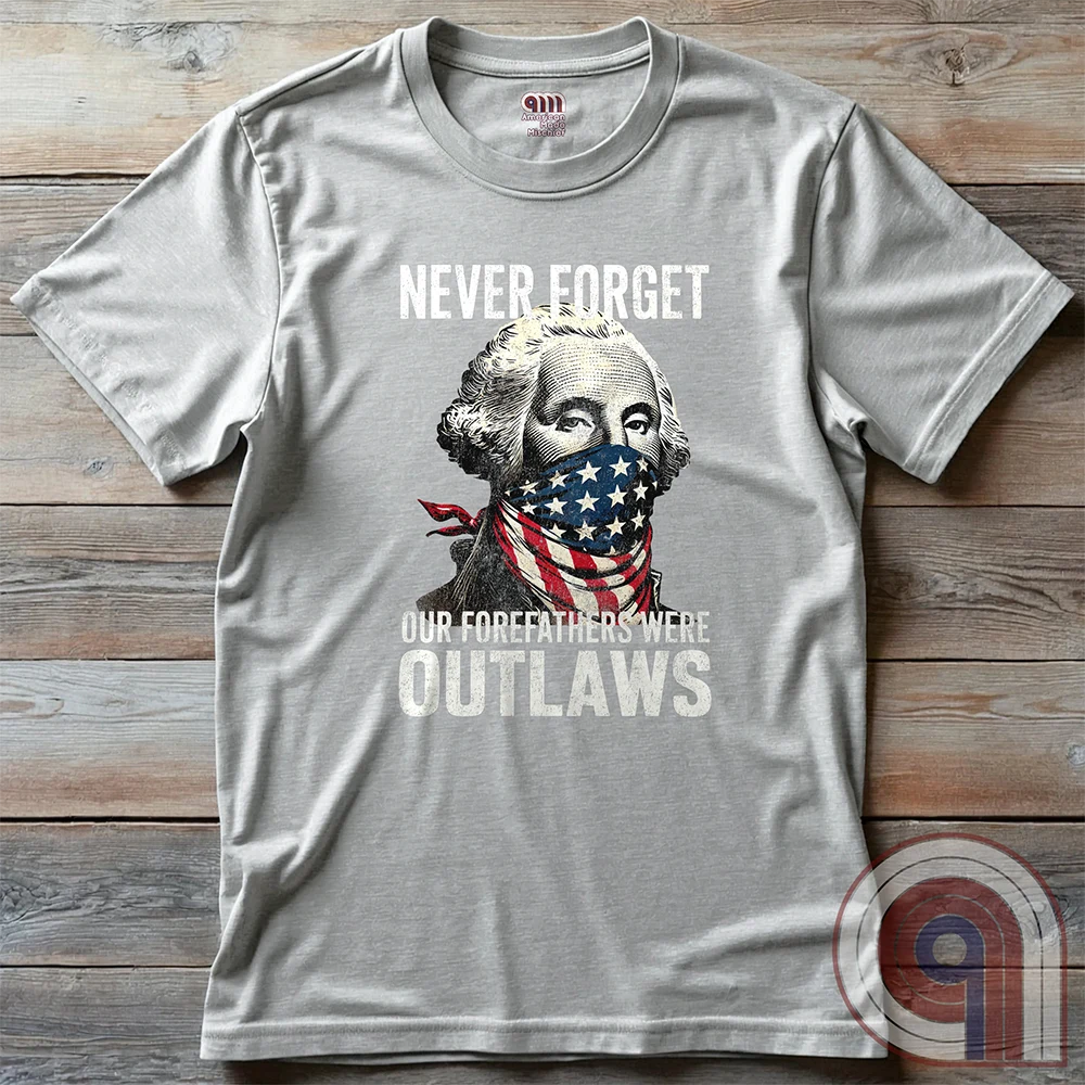 Never forget—our Founding Fathers were outlaws who defied tyranny and risked everything for freedom. This patriotic t-shirt features George Washington wearing an American flag bandana, symbolizing the rebellious spirit that forged a nation. A bold statement for those who stand against government overreach, censorship, & oppression. Perfect for history lovers, 2A supporters, & patriots who honor the fight for liberty. Wear it proudly and remind the world—freedom isn’t given, it’s taken. Color-Ash2