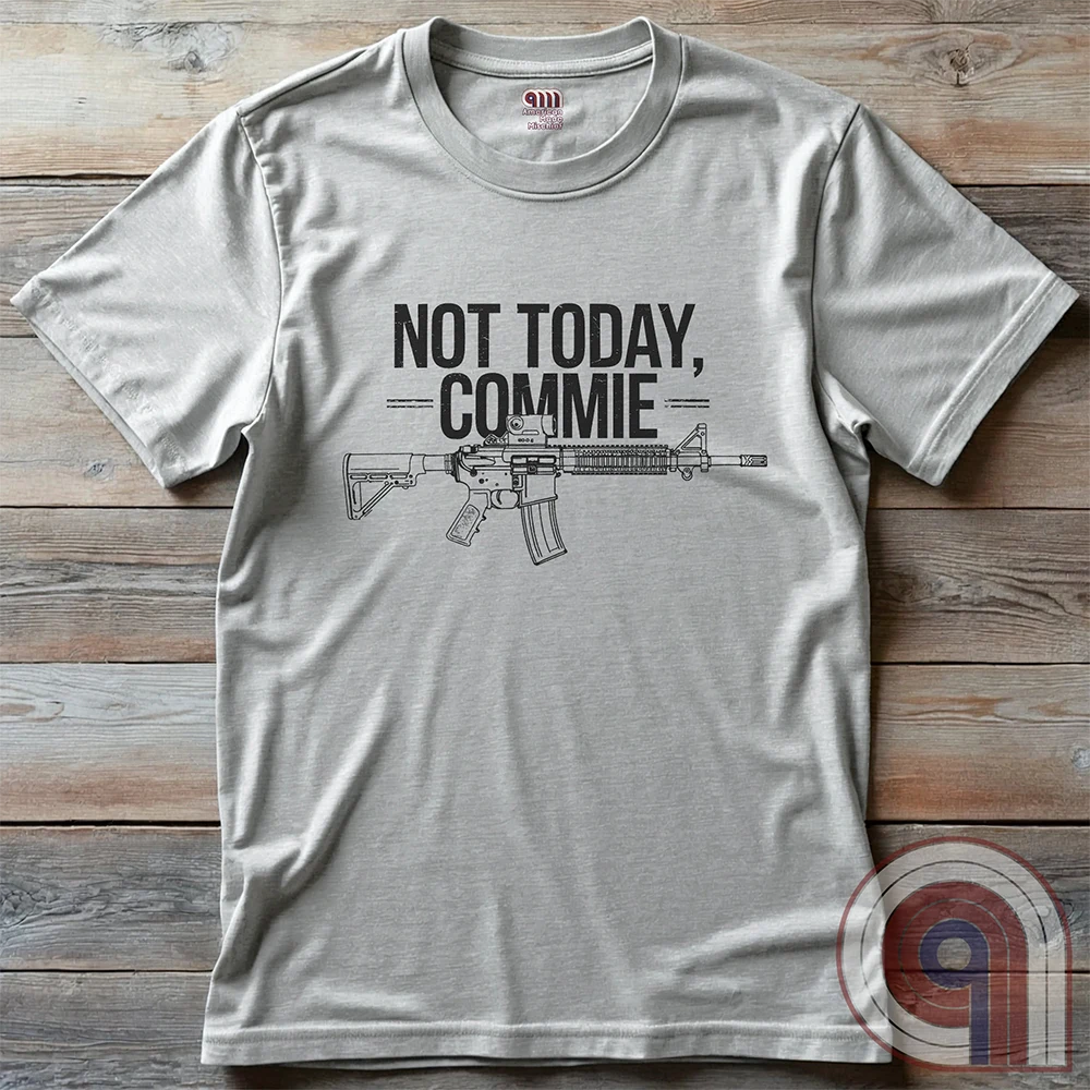 Stand your ground with the Not Today, Commie t-shirt—bold, defiant, and unapologetic. Featuring a detailed AR-15 rifle and a hard-hitting message, this Second Amendment shirt is for patriots who refuse to bow to tyranny. A perfect statement for gun owners, military vets, and freedom lovers who stand against communism, government overreach, and anti-2A agendas. Show your unwavering commitment to self-defense, American liberty, and the right to bear arms. Because freedom isn’t negotiable. Color: Ash