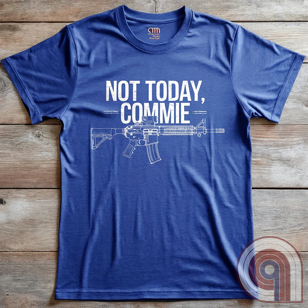 Stand your ground with the Not Today, Commie t-shirt—bold, defiant, and unapologetic. Featuring a detailed AR-15 rifle and a hard-hitting message, this Second Amendment shirt is for patriots who refuse to bow to tyranny. A perfect statement for gun owners, military vets, and freedom lovers who stand against communism, government overreach, and anti-2A agendas. Show your unwavering commitment to self-defense, American liberty, and the right to bear arms. Because freedom isn’t negotiable. Color: Blue