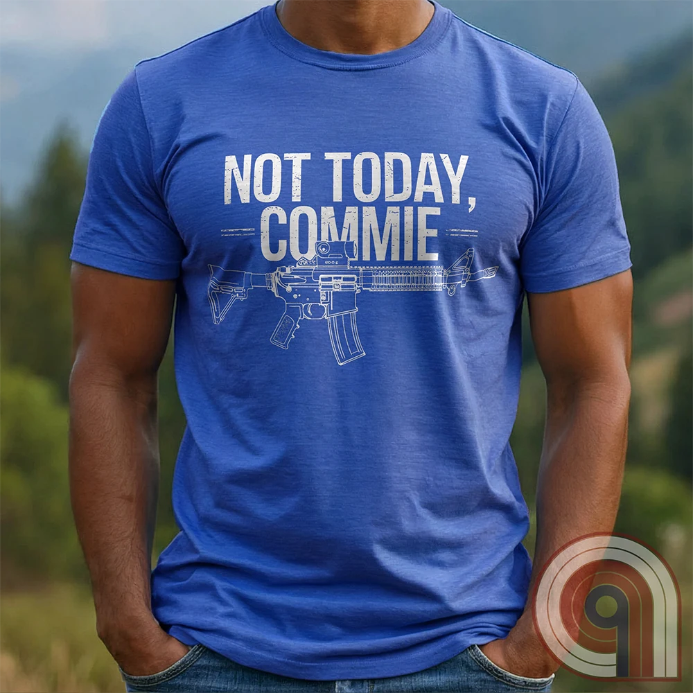 Stand your ground with the Not Today, Commie t-shirt—bold, defiant, and unapologetic. Featuring a detailed AR-15 rifle and a hard-hitting message, this Second Amendment shirt is for patriots who refuse to bow to tyranny. A perfect statement for gun owners, military vets, and freedom lovers who stand against communism, government overreach, and anti-2A agendas. Show your unwavering commitment to self-defense, American liberty, and the right to bear arms. Because freedom isn’t negotiable. Color: Blue1