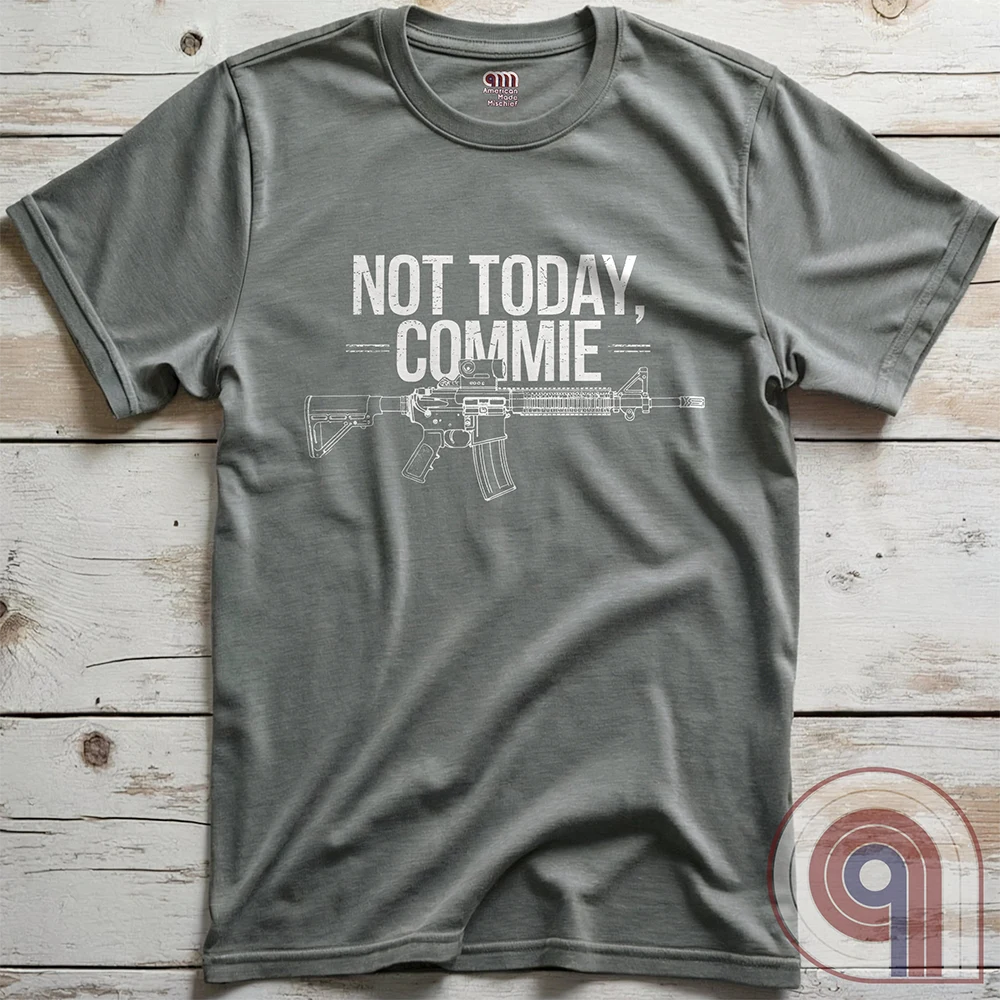 Stand your ground with the Not Today, Commie t-shirt—bold, defiant, and unapologetic. Featuring a detailed AR-15 rifle and a hard-hitting message, this Second Amendment shirt is for patriots who refuse to bow to tyranny. A perfect statement for gun owners, military vets, and freedom lovers who stand against communism, government overreach, and anti-2A agendas. Show your unwavering commitment to self-defense, American liberty, and the right to bear arms. Because freedom isn’t negotiable. Color: Grey