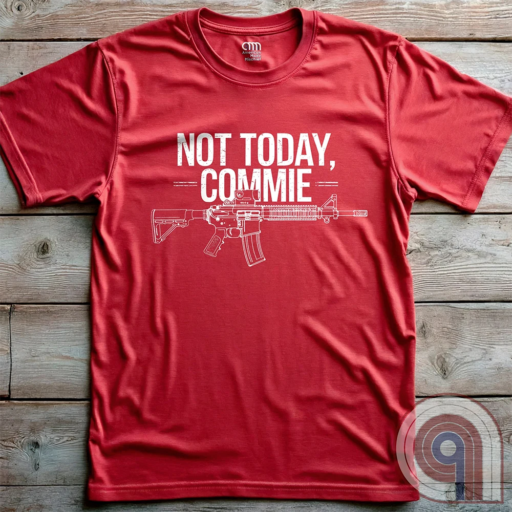 Stand your ground with the Not Today, Commie t-shirt—bold, defiant, and unapologetic. Featuring a detailed AR-15 rifle and a hard-hitting message, this Second Amendment shirt is for patriots who refuse to bow to tyranny. A perfect statement for gun owners, military vets, and freedom lovers who stand against communism, government overreach, and anti-2A agendas. Show your unwavering commitment to self-defense, American liberty, and the right to bear arms. Because freedom isn’t negotiable. Color: Red