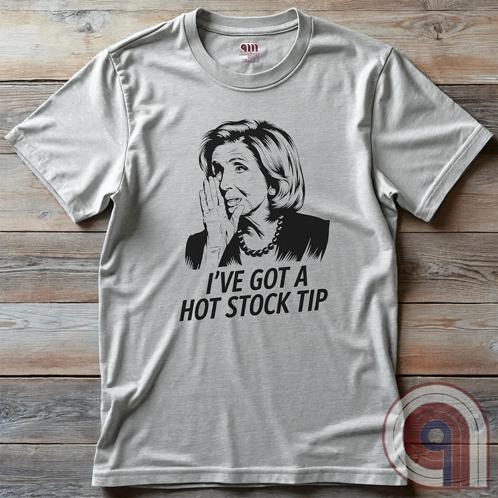 Nancy Pelosi Hot Stock Tip T-Shirt – Bold political satire tee exposing congressional insider trading and corruption. Featuring Nancy Pelosi whispering stock market secrets, this design calls out the privilege and hypocrisy of career politicians who grift for profit while everyday Americans struggle. Perfect for conservatives, libertarians, & anti-establishment free thinkers who see through the rigged system. Wear this to spark conversations, mock the elites, & remind them – we’re onto you. Color- Ash2