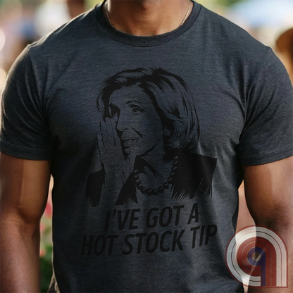 Nancy Pelosi Hot Stock Tip T-Shirt – Bold political satire tee exposing congressional insider trading and corruption. Featuring Nancy Pelosi whispering stock market secrets, this design calls out the privilege and hypocrisy of career politicians who grift for profit while everyday Americans struggle. Perfect for conservatives, libertarians, & anti-establishment free thinkers who see through the rigged system. Wear this to spark conversations, mock the elites, & remind them – we’re onto you. Color- Charc1