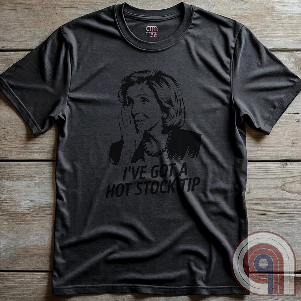 Nancy Pelosi Hot Stock Tip T-Shirt – Bold political satire tee exposing congressional insider trading and corruption. Featuring Nancy Pelosi whispering stock market secrets, this design calls out the privilege and hypocrisy of career politicians who grift for profit while everyday Americans struggle. Perfect for conservatives, libertarians, & anti-establishment free thinkers who see through the rigged system. Wear this to spark conversations, mock the elites, & remind them – we’re onto you. Color-Charc2