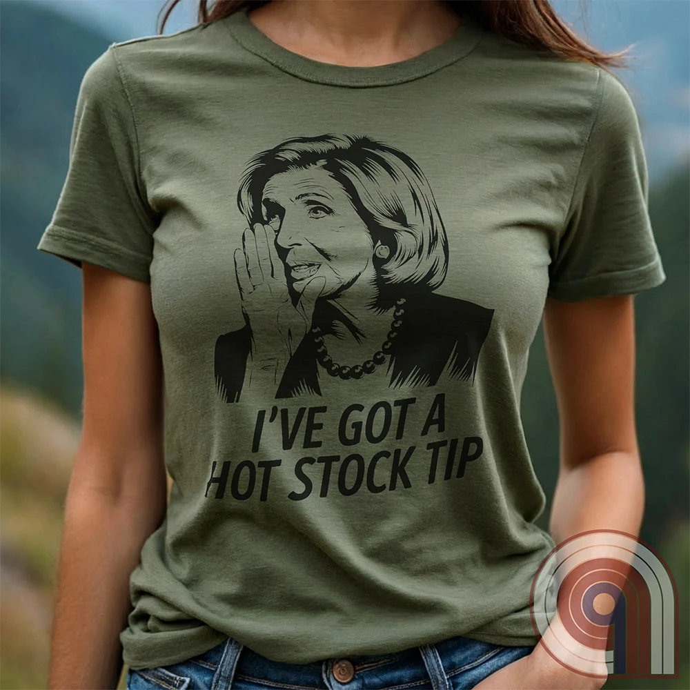 Nancy Pelosi Hot Stock Tip T-Shirt – Bold political satire tee exposing congressional insider trading and corruption. Featuring Nancy Pelosi whispering stock market secrets, this design calls out the privilege and hypocrisy of career politicians who grift for profit while everyday Americans struggle. Perfect for conservatives, libertarians, & anti-establishment free thinkers who see through the rigged system. Wear this to spark conversations, mock the elites, & remind them – we’re onto you. Color- Green1