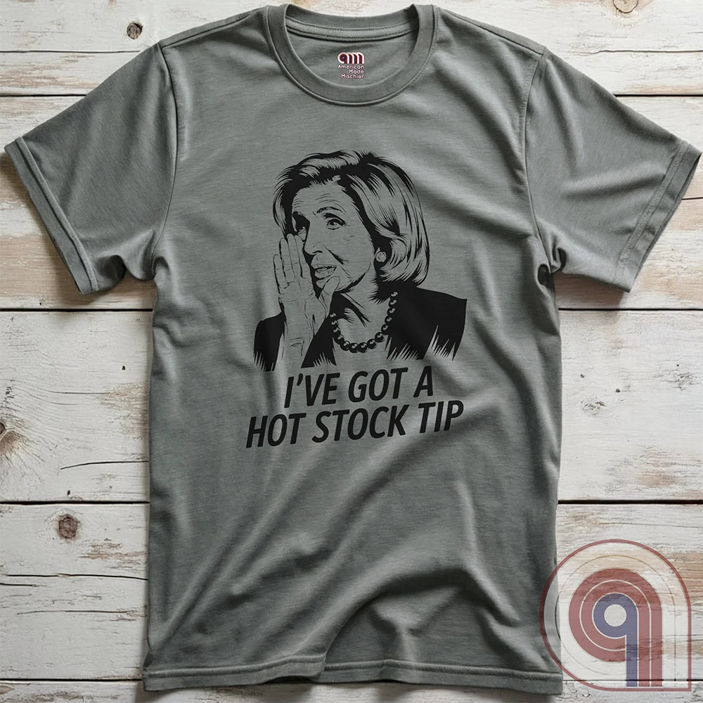 Nancy Pelosi Hot Stock Tip T-Shirt – Bold political satire tee exposing congressional insider trading and corruption. Featuring Nancy Pelosi whispering stock market secrets, this design calls out the privilege and hypocrisy of career politicians who grift for profit while everyday Americans struggle. Perfect for conservatives, libertarians, & anti-establishment free thinkers who see through the rigged system. Wear this to spark conversations, mock the elites, & remind them – we’re onto you. Color- Grey2