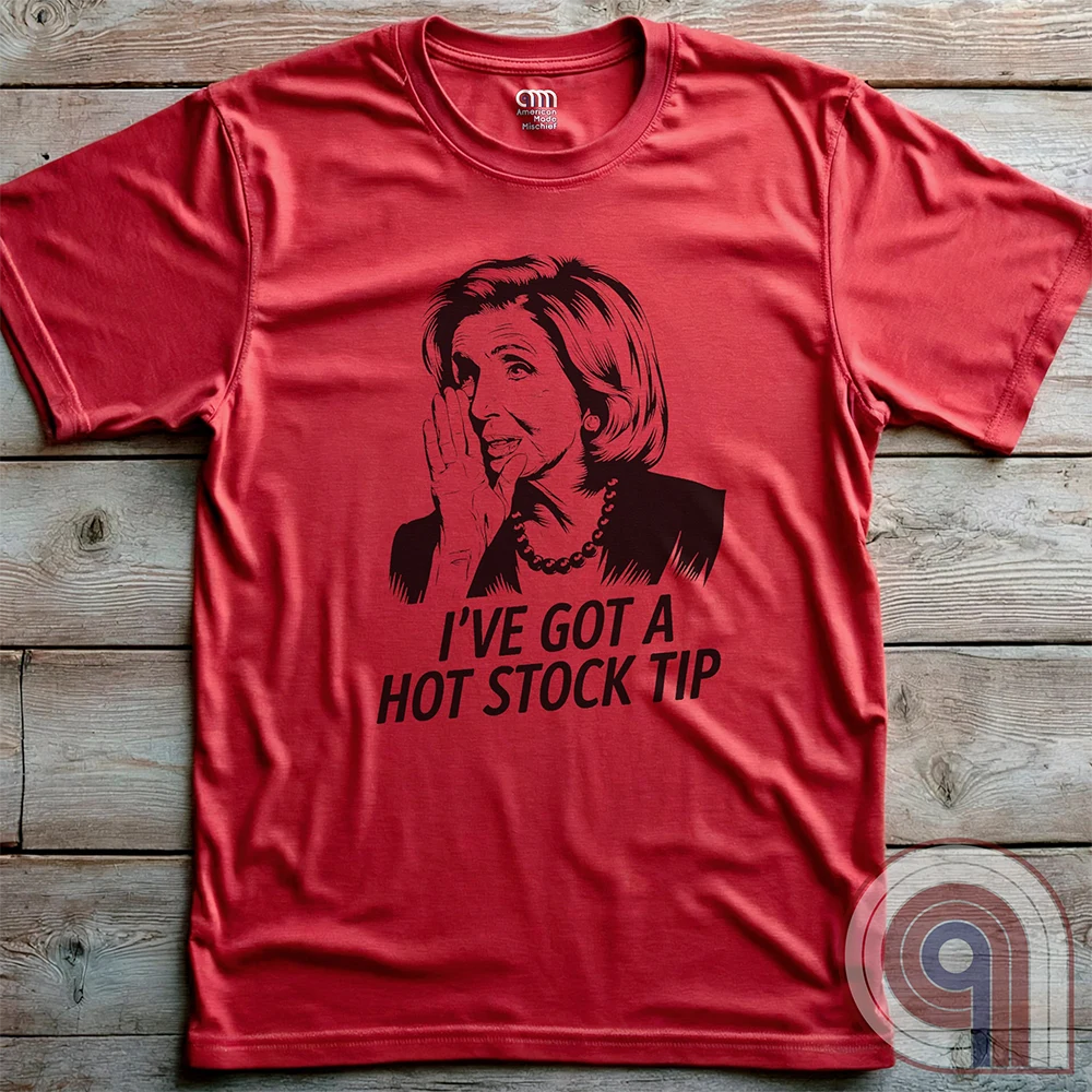 Nancy Pelosi Hot Stock Tip T-Shirt – Bold political satire tee exposing congressional insider trading and corruption. Featuring Nancy Pelosi whispering stock market secrets, this design calls out the privilege and hypocrisy of career politicians who grift for profit while everyday Americans struggle. Perfect for conservatives, libertarians, & anti-establishment free thinkers who see through the rigged system. Wear this to spark conversations, mock the elites, & remind them – we’re onto you. Color- Red2