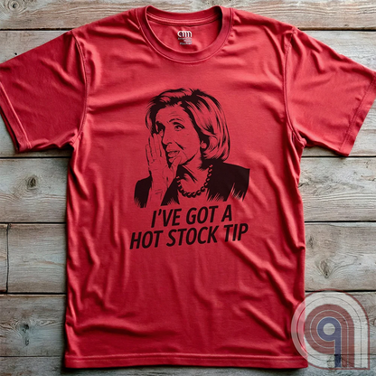 Nancy Pelosi Hot Stock Tip T-Shirt – Bold political satire tee exposing congressional insider trading and corruption. Featuring Nancy Pelosi whispering stock market secrets, this design calls out the privilege and hypocrisy of career politicians who grift for profit while everyday Americans struggle. Perfect for conservatives, libertarians, & anti-establishment free thinkers who see through the rigged system. Wear this to spark conversations, mock the elites, & remind them – we’re onto you. Color- Red2