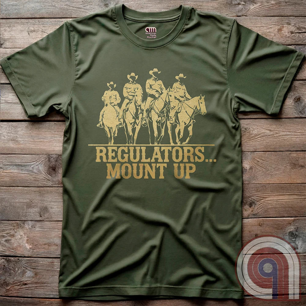 Ride high with the 'Regulators... Mount Up' t-shirt, a fearless call to action for patriots who stand for unity, resilience, & the preservation of American values. Inspired by frontier justice, this Western tee embodies the spirit of Texas Rangers, Border Patrol Agents, & Minute-Men. A tribute to law & order, standing strong, & defending freedom, it's perfect for those who believe in 2A, 1A, & American spirit. Whether you're a cowboy, prepper, or patriot, wear it with pride and ride for liberty. Green