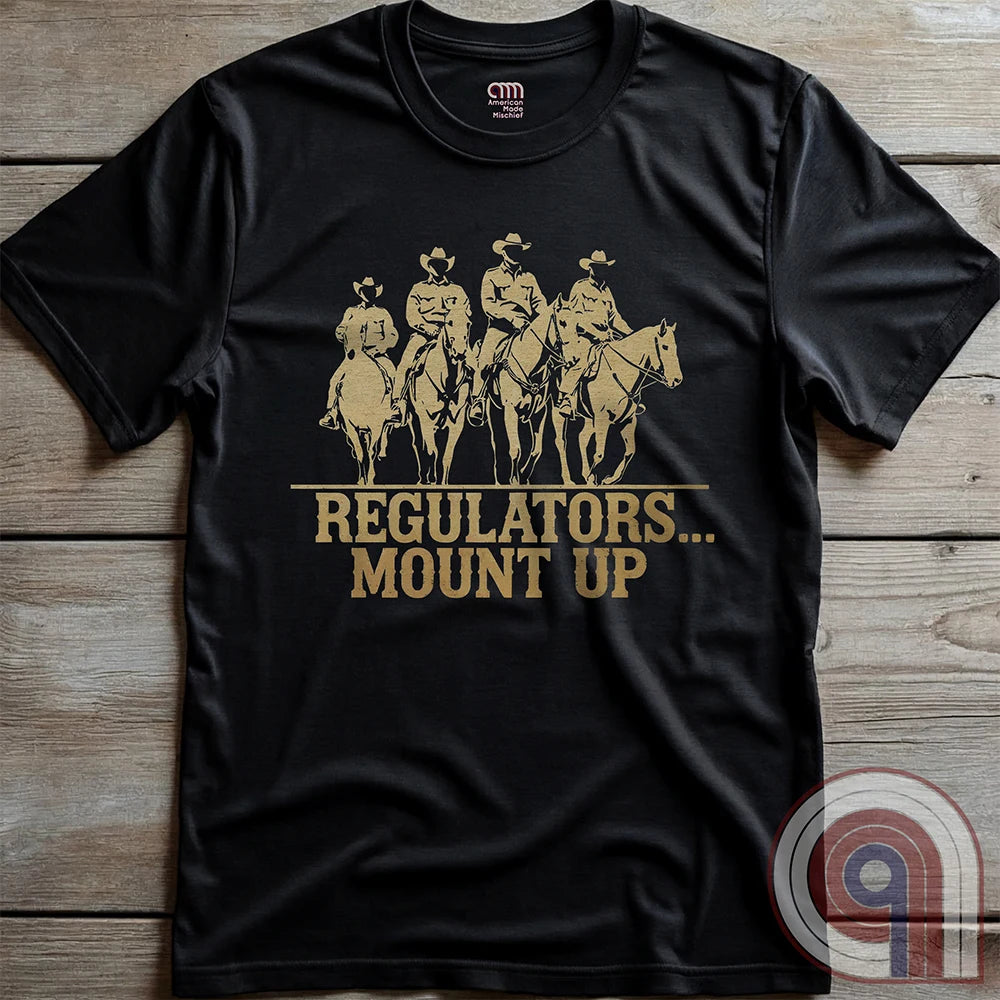Ride high with the 'Regulators... Mount Up' t-shirt, a fearless call to action for patriots who stand for unity, resilience, & the preservation of American values. Inspired by frontier justice, this Western tee embodies the spirit of Texas Rangers, Border Patrol Agents, & Minute-Men. A tribute to law & order, standing strong, & defending freedom, it's perfect for those who believe in 2A, 1A, & American spirit. Whether you're a cowboy, prepper, or patriot, wear it with pride and ride for liberty. Charcoal