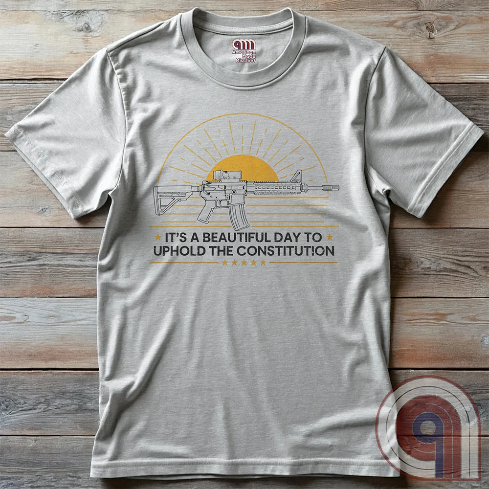 Every sunrise brings another day to stand your ground. This pro-gun rights t-shirt isn’t just a statement—it’s a battle cry. Featuring a minimalist AR-15 silhouette against the morning light, this 2A apparel is made for those who know that freedom comes from the barrel of a gun. For gun owners, veterans, and warriors who refuse to be disarmed. Wear it loudly- This Tee isn’t just about rights—it’s about survival. A bold warning to tyrants: We are locked, loaded, and ready to defend what’s ours. Color- Ash