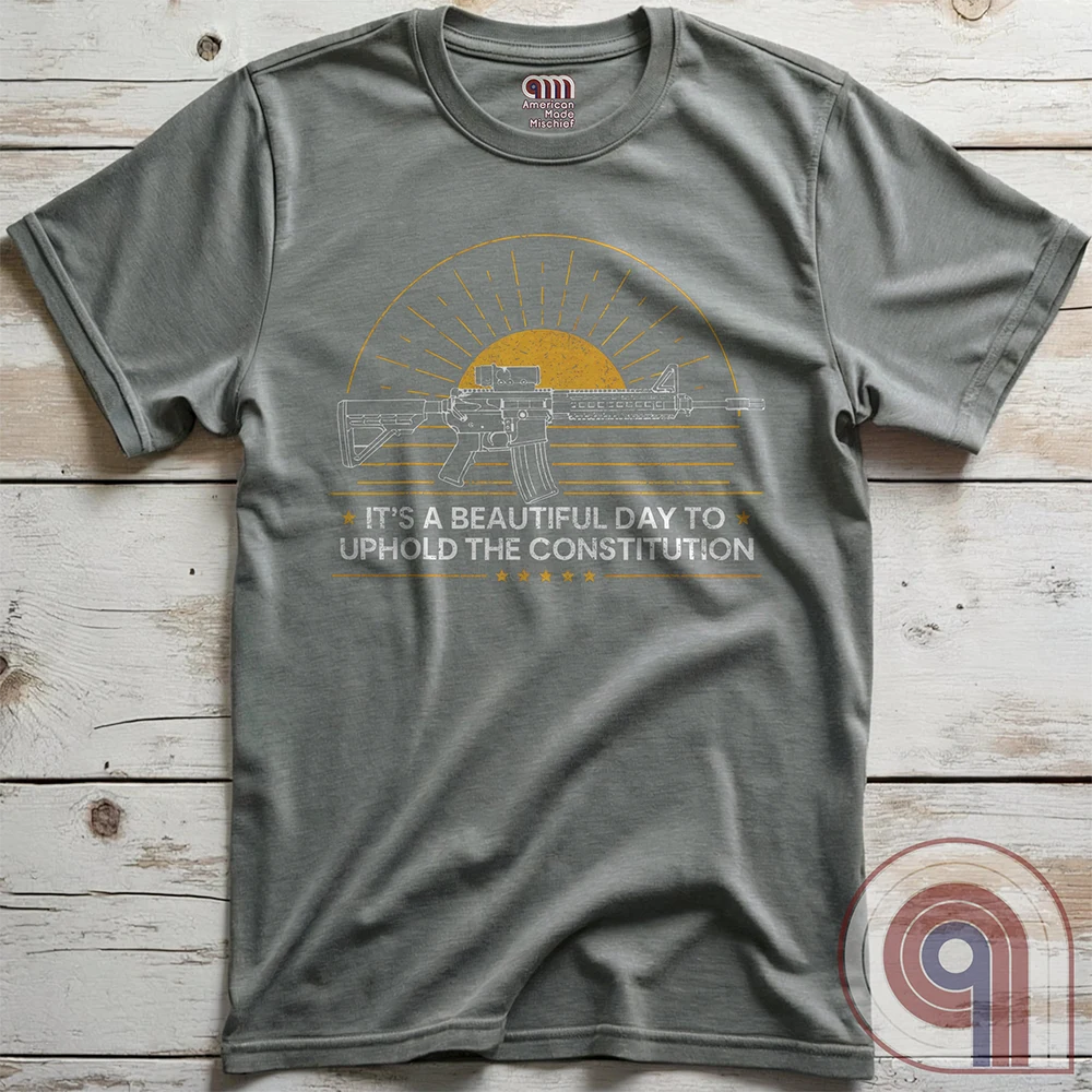 Every sunrise brings another day to stand your ground. This pro-gun rights t-shirt isn’t just a statement—it’s a battle cry. Featuring a minimalist AR-15 silhouette against the morning light, this 2A apparel is made for those who know that freedom comes from the barrel of a gun. For gun owners, veterans, and warriors who refuse to be disarmed. Wear it loudly- This Tee isn’t just about rights—it’s about survival. A bold warning to tyrants: We are locked, loaded, and ready to defend what’s ours. Color- Grey