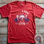 Revolution meets the racetrack with this Talladega Nights-inspired “Shake & Bake 1776” design, featuring George Washington and Benjamin Franklin throwing a victorious fist bump. A patriotic mashup of NASCAR culture and Founding Father grit, this tee celebrates American independence with speed, style, and historical swagger. Perfect for history buffs, liberty lovers, and anyone who believes in freedom, fast cars, and finishing first—because if you ain’t first, you’re last! Comedy Parody Tee. Color-Red