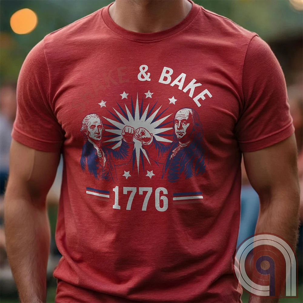 Revolution meets the racetrack with this Talladega Nights-inspired “Shake & Bake 1776” design, featuring George Washington and Benjamin Franklin throwing a victorious fist bump. A patriotic mashup of NASCAR culture and Founding Father grit, this tee celebrates American independence with speed, style, and historical swagger. Perfect for history buffs, liberty lovers, and anyone who believes in freedom, fast cars, and finishing first—because if you ain’t first, you’re last! Comedy Parody Tee. Color-Red