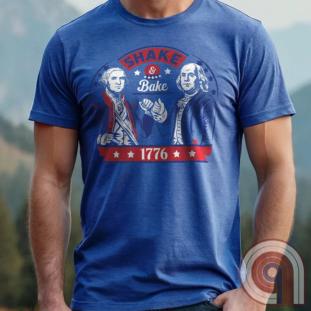 Shake & Bake 1776 t-shirt - George Washington and Thomas Jefferson pulling off a legendary Talladega Nights-style fist bump. Inspired by the Ricky Bobby & Cal Naughton Jr. duo, this design blends NASCAR culture with American Revolution history for a high-octane dose of freedom, fast cars, & Founding Fathers. For patriots, history buffs, & fans of red, white, & blue mischief, this tee is a must-have for those who live life in the fast lane and embrace American independence with a comedic twist. Color-Blue